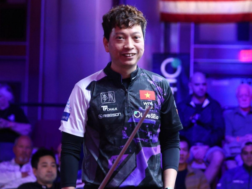 Dương Quốc Hoàng trong trận đấu với Michael Baoanan