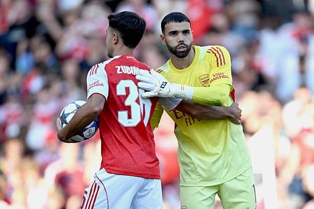 Martin Zubimendi and David Raya